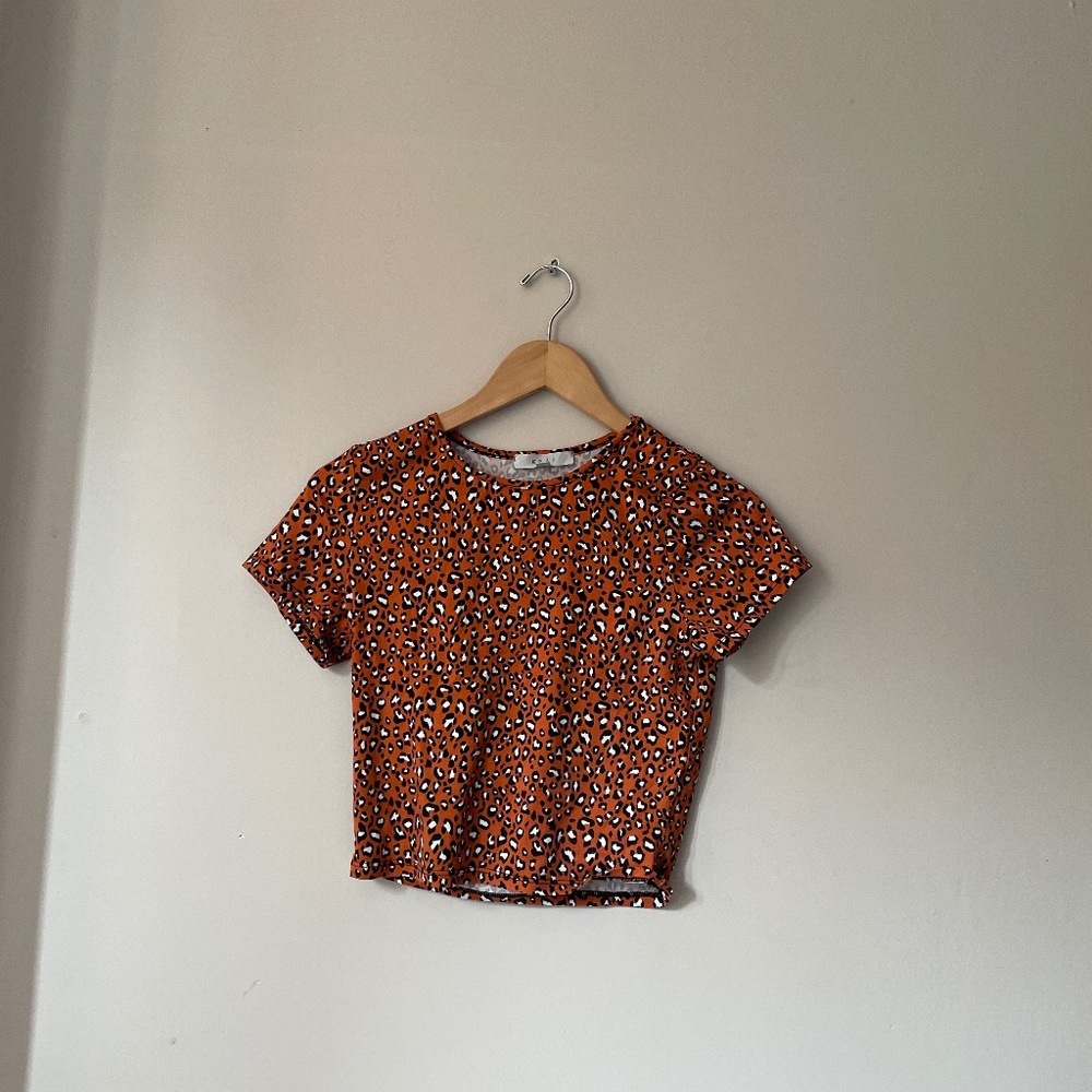 Used gaze cheetah print shirt size small could fit 9-12